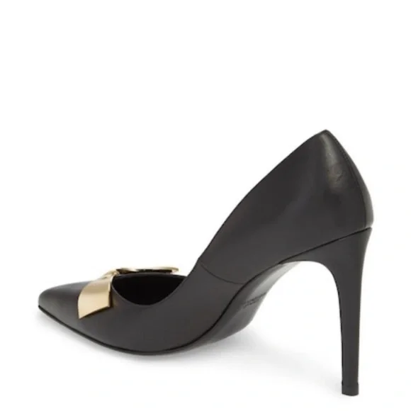 Stuart Weitzman black heel with gold bow detail
